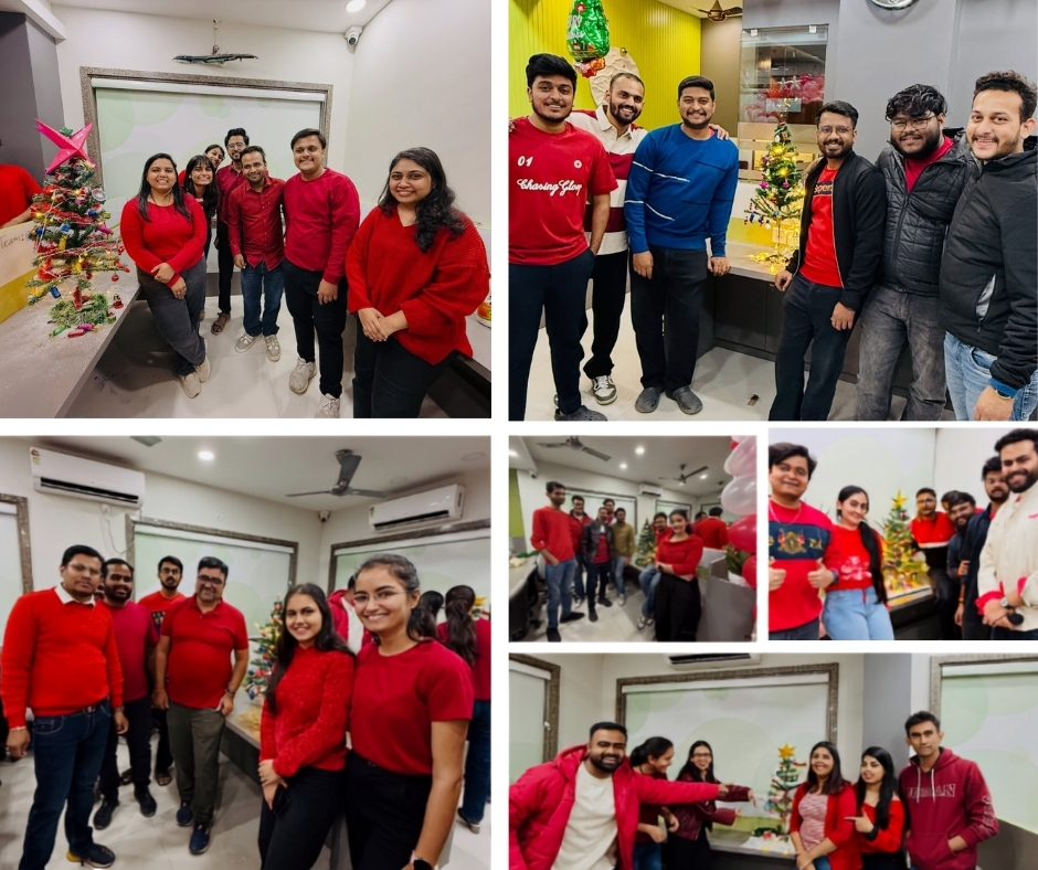 Genesis teams posing with their decorated Christmas trees
